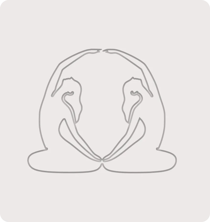Warm portrait of a woman's back and shoulder, hand resting on her neck