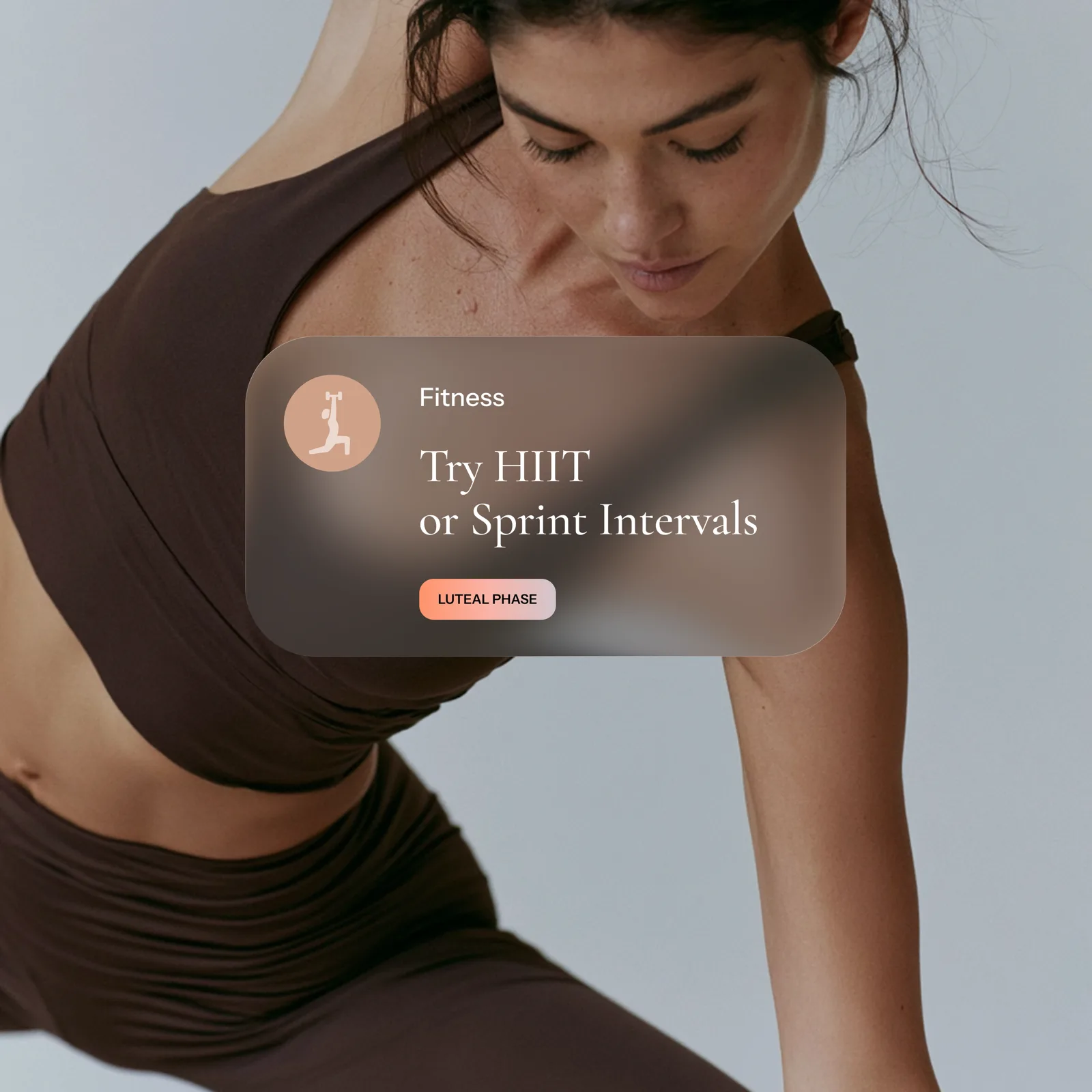 Woman moving through a dynamic pose in activewear